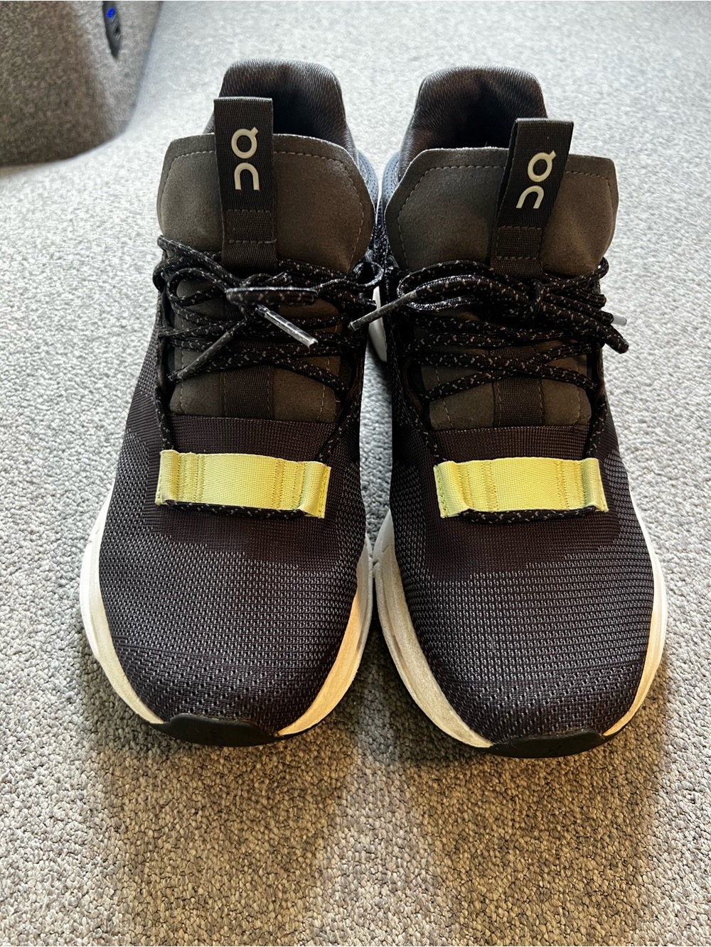 On Running Black Sneakers with Yellow Strap Detail